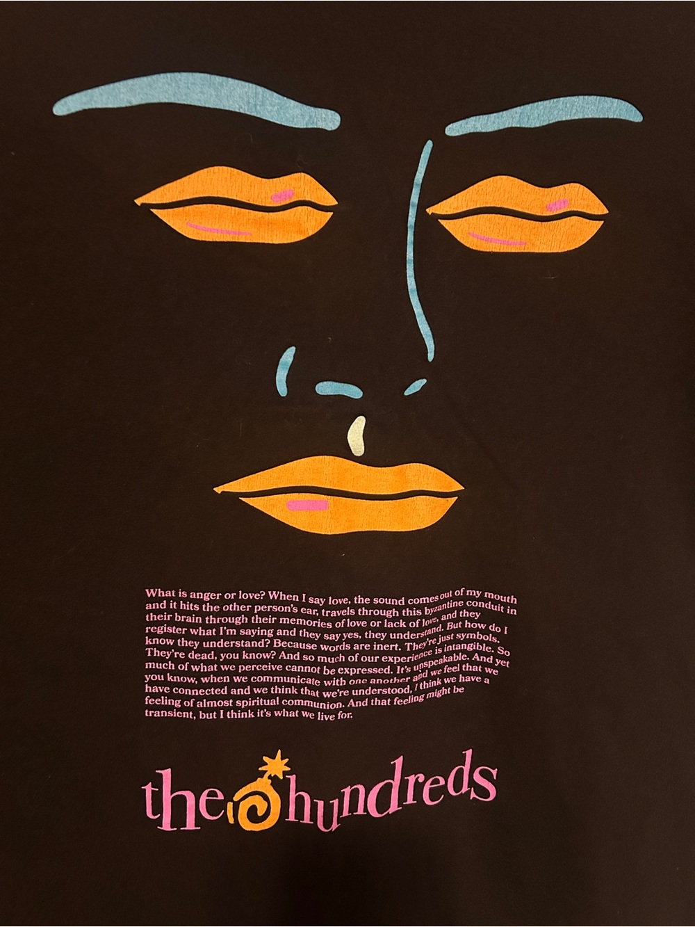 The Hundreds Black Tee with Orange Lips & Blue Face Accents